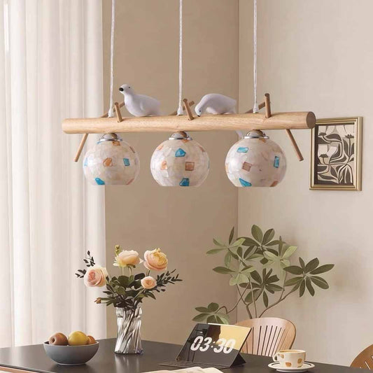 Linear Chandelier vs. Multiple Pendants Over a Dining Table