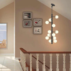 Chandelier Glass Globe High Sloped Ceiling White Black Staircase