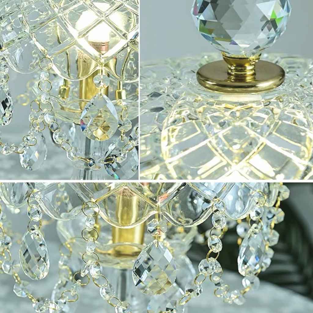 Detalle de lámpara de mesa con gotas de cristal transparente