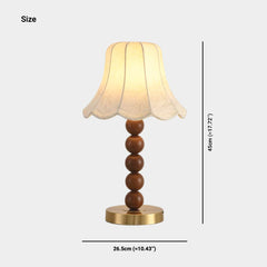 Tischlampe mit Stoffschirm und dekorativer Holzperle